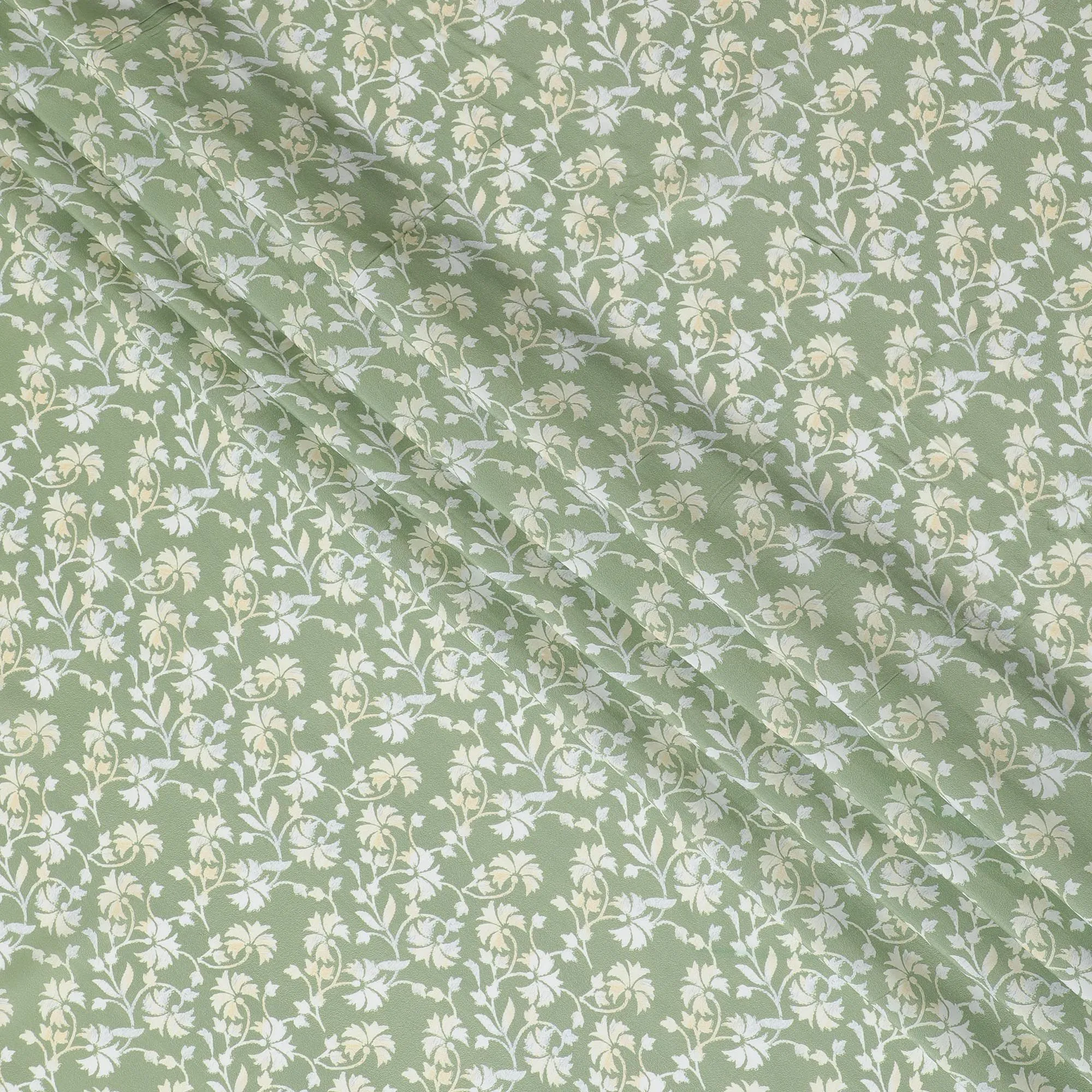 Spring Meadow Viscose Crepe Fabric - Refreshing Green with White Florals, 110cm Width (India)  - D17643